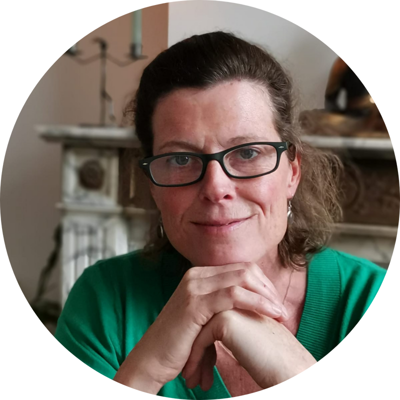 Professional headshot of Kristien ("Christine") Van Evelghem
