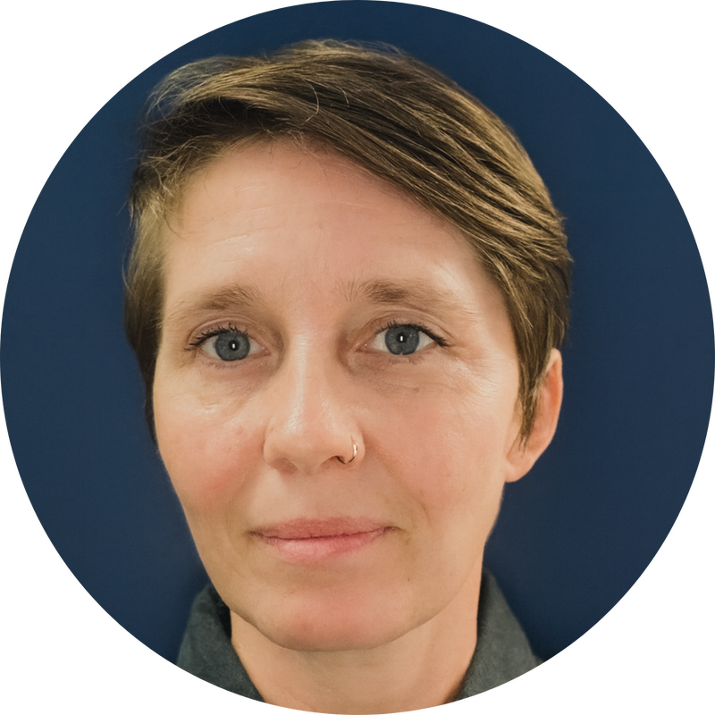 Professional headshot of Reine Hewitt